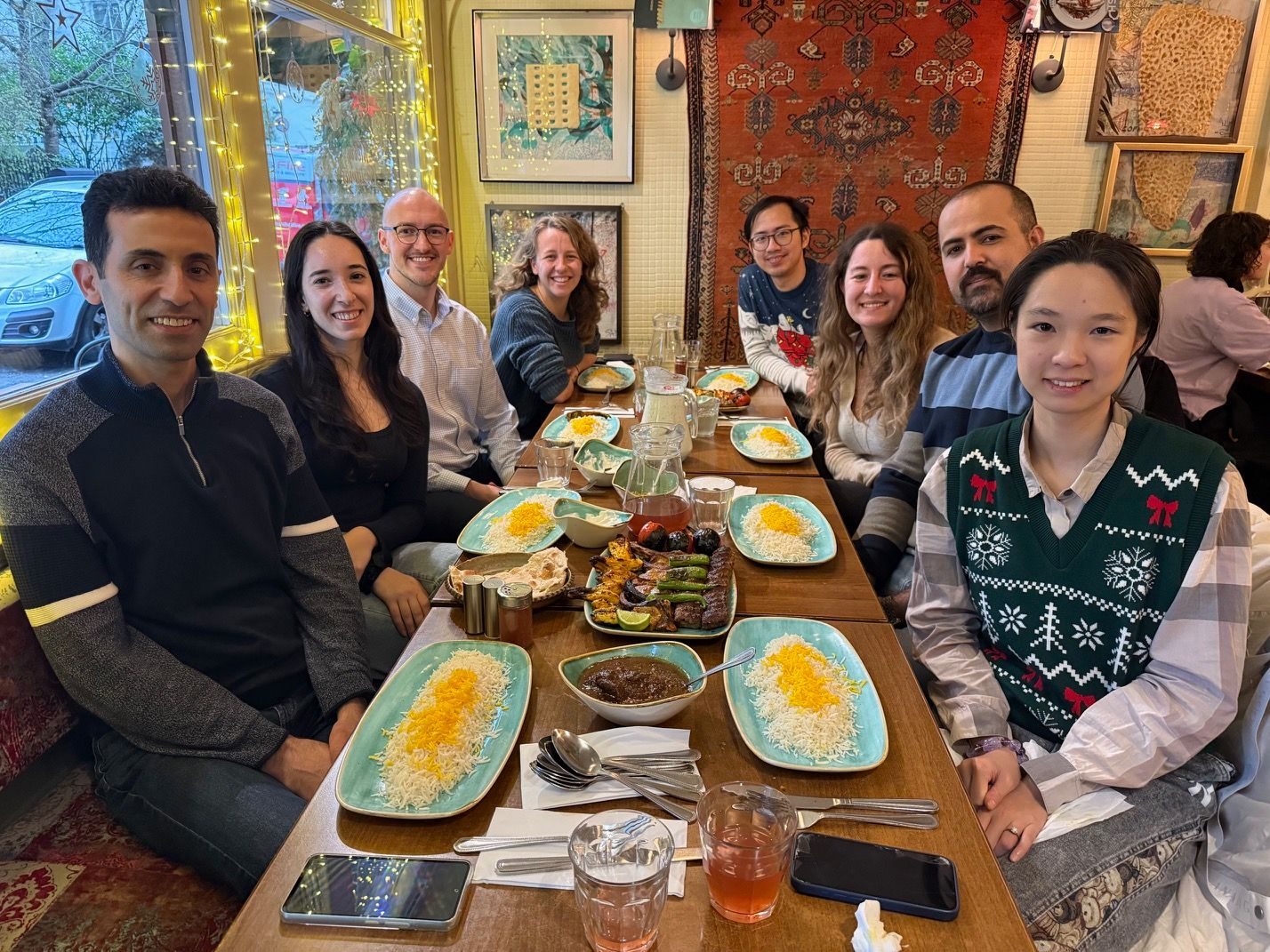 The lab around the table at a Persian restaurant for the 2025 Christmas dinner.