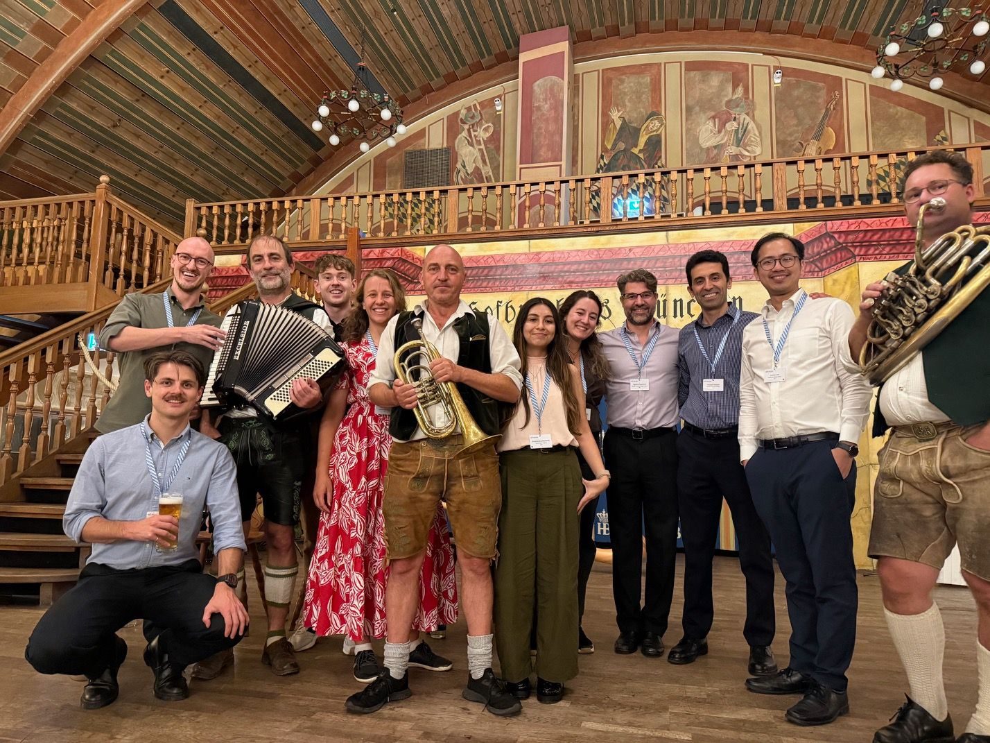 The HEAD Lab group with the Bavarian band at the IRCOBI 2026 conference dinner in the Hofbräuhaus, Munich.