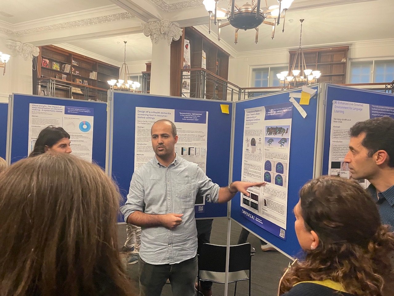 Vahid Darvishi presenting his poster on computational models of the brain for neurological conditions at the Dyson School poster symposium.