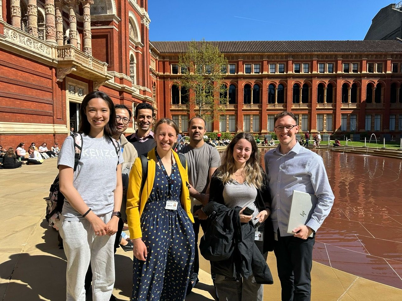 The HEAD Lab team by the fountain in the V&A courtyard on a sunny day.