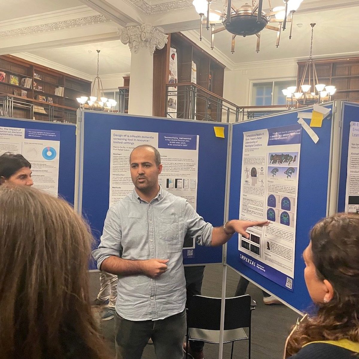 Vahid Darvishi presenting his poster at the Dyson School poster symposium.